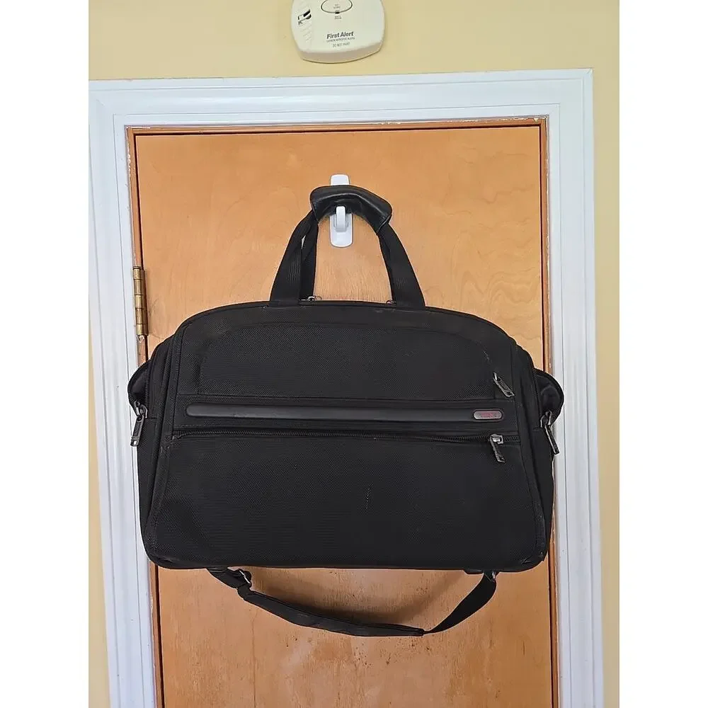 Tumi approx 17x12x8